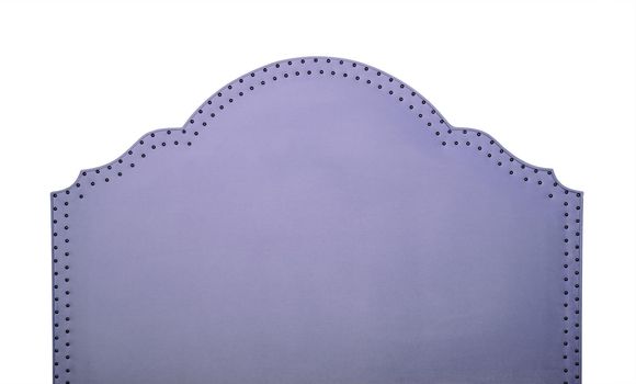Purple soft velvet bed headboard isolated on white