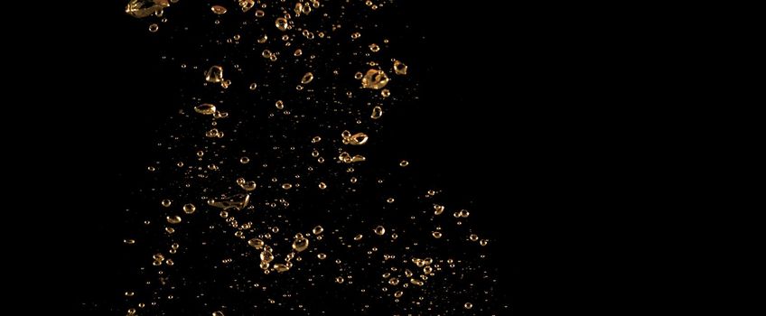 Close up images of oil bubbles from diesel gasoline splashing 