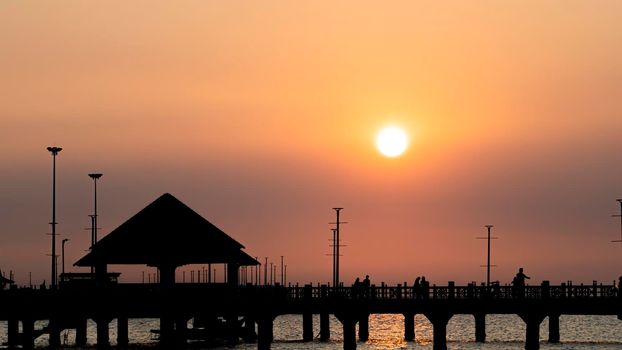 Bangsan Chonburi Thailand jetty and sunset. At Bangsan beach
