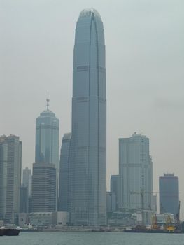 Skyscrapers of Hong Kong. cityscape through a haze of smog over the city.