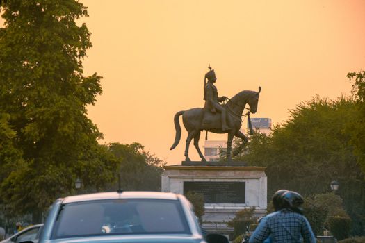 Madho singh statue with horse shot at dusk near albert hall in jaipur a landmark in the city and an often visited spot