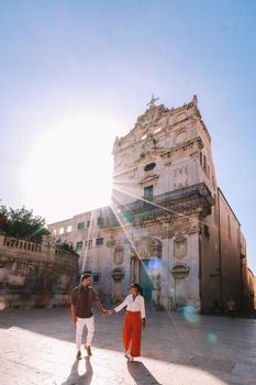 Syracause Sicily Italy, couple men and woman on city trip at Syracusa Sicilia