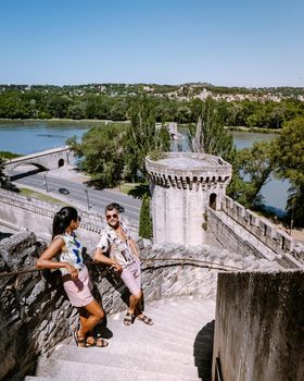 couple city trip Avignon Southern France, Ancient Popes Palace, Saint-Benezet, Avignon, Provence, France