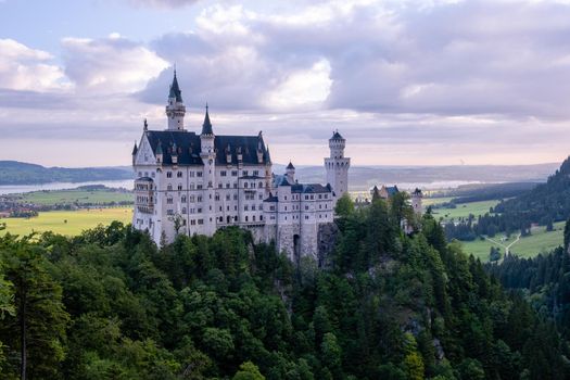 Beautiful view of world-famous Neuschwanstein Castle, the nineteenth-century Romanesque Revival palace built for King Ludwig II on a rugged cliff near Fussen, southwest Bavaria, Germany