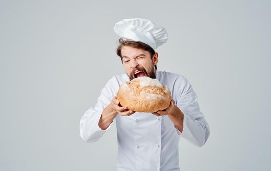 Man with brisk fresh bread chef professional headdress food