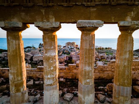 View on sea and ruins of greek columns in Selinunte Archaeological Park