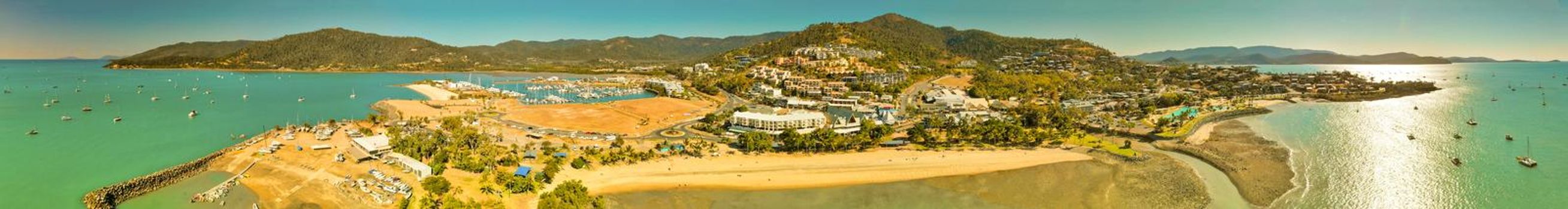 Panoramic aerial view of Airlie Beach on a beautiful sunny day
