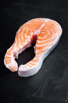 Fesh raw trout fillet, over black background
