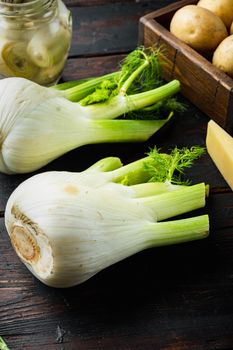 Genuine and fresh raw fennel, on old wooden table