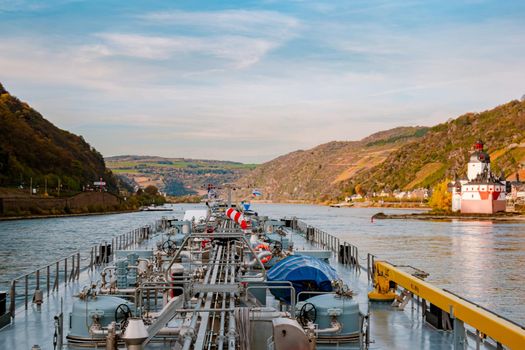 Binnenvaart, Translation Inlandshipping on the river rhein in Germany during sunset hours, Gas tanker vessel rhine river oil and gas transport