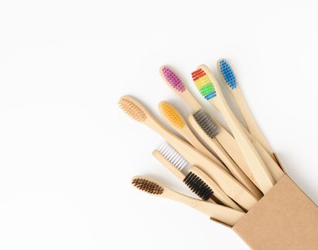 wooden toothbrushes on a white background, plastic rejection concept