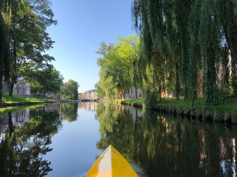 Canoeing at the canal around the old town of Sneek 