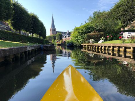 Canoeing through the canal in IJlst
