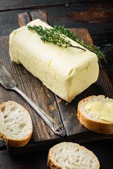 Rustic farmhouse inspired butter, on old dark wooden table background