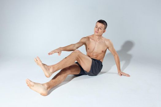 man doing exercise indoors sport fitness bodybuilding model