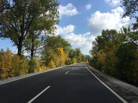 Driving during autumn towards Poroszlo 