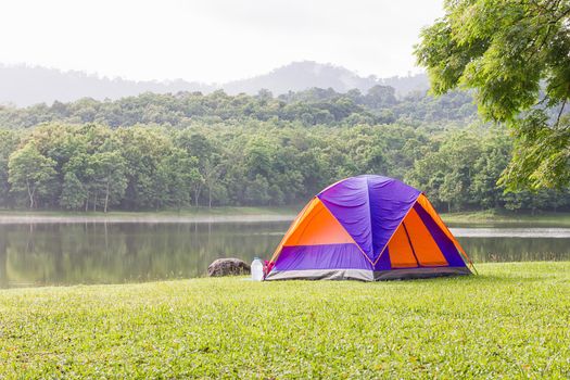 Dome tents camping at lake side  