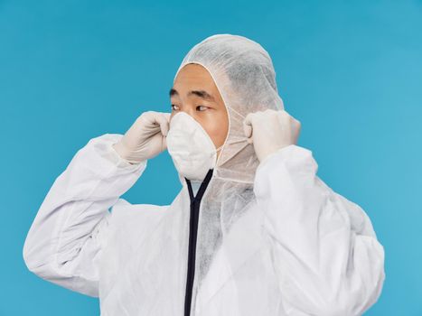 male laboratory assistant protective clothing laboratory scientists blue background