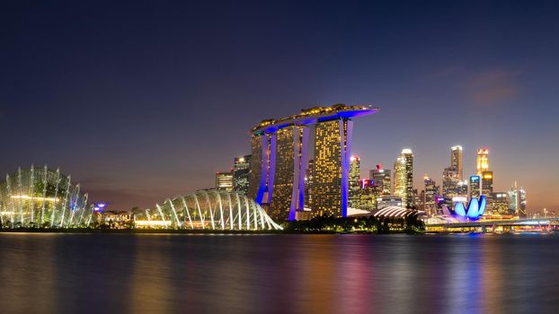 Panorama view of business downtown building area during twilight time at Singapore.