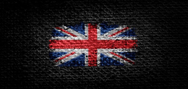 National flag of the United Kingdom on dark fabric