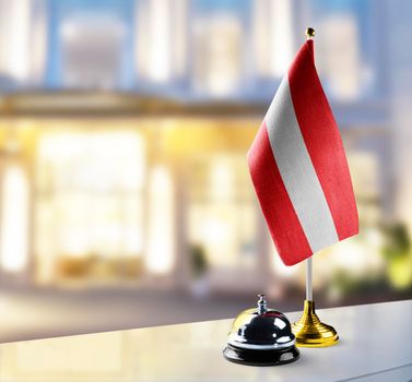 Austria flag on the reception desk in the lobby of the hotel