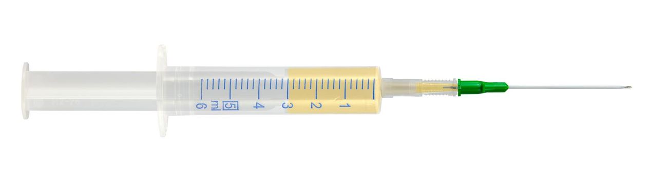 Isolated Syringe With Hypodermic Needle Filled With Vaccine For Covid-19