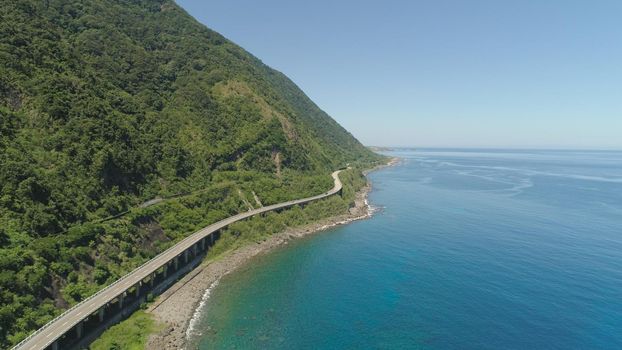 Highway on the viaduct by the sea. Philippines, Luzon