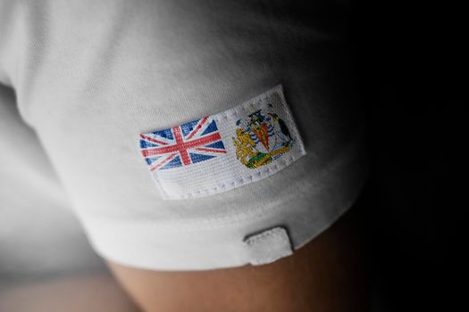 Patch of the national flag of the British Antarctic Territory on a white t-shirt