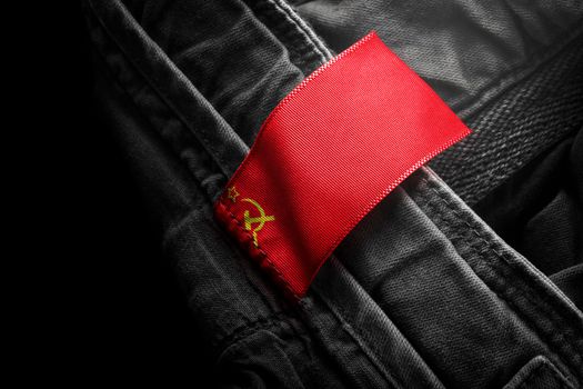 Tag on dark clothing in the form of the flag of the USSR