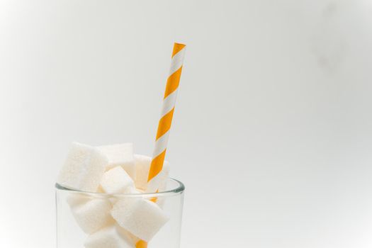 sugar cubes in a glass with a straw calories cocktail glucose sweets