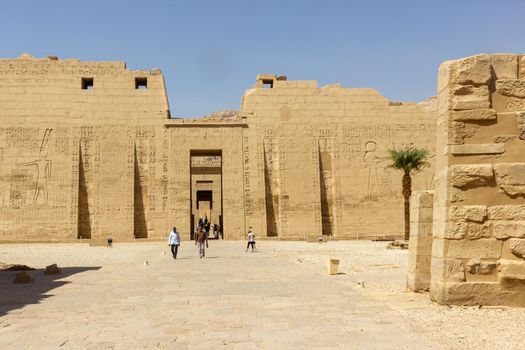 Entrance of the Medinet Habu temple covered in hieroglyphs