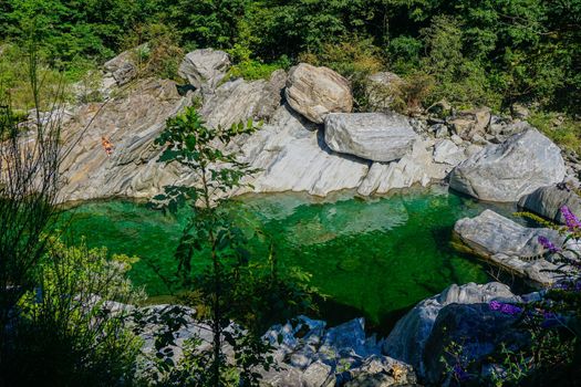 Close view on turquois pool of the Maggia river, Ticino, Switzerland