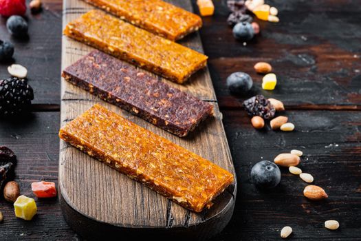 Dried fruits bars, on wooden table
