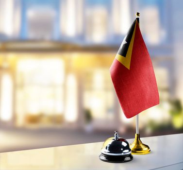East Timor flag on the reception desk in the lobby of the hotel