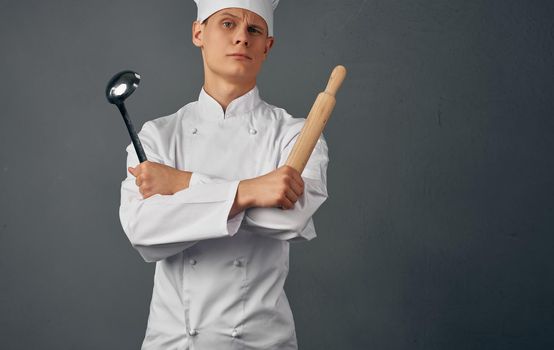 male chef kitchenware cooking in restaurant studio