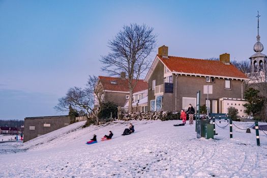 snow covered dike in the Netherlands during winter at Urk Netherlands