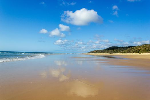 main transportation highway on Fraser Island - wide wet sand beach coast facing Pacific ocean - long 75 miles beach