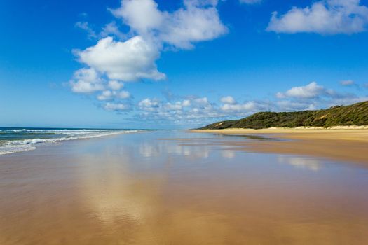 Main transportation highway on Fraser Island - wide wet sand beach coast facing Pacific ocean - long 75 miles beach