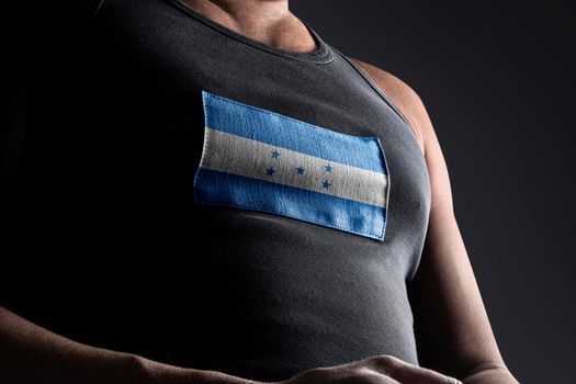 The national flag of Honduras on the athlete's chest