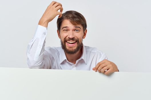 Cheerful man in white shirt presentation Copy Space advertisement