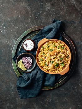 Pakistani chicken biryani rice, top view, vertical
