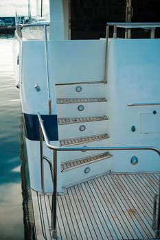 Details of the hull of a white yacht
