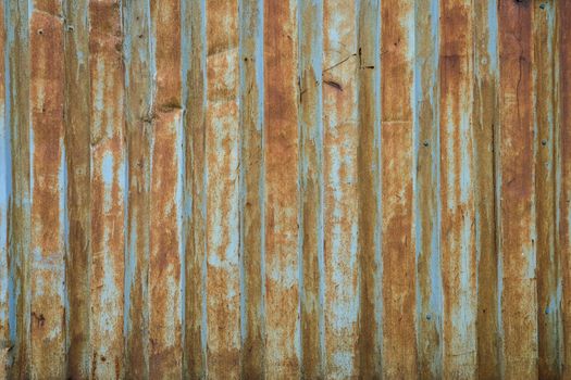 Texture painted rusted metal, colored background with iron fence. grunge green-yellow old dirty abstract Background