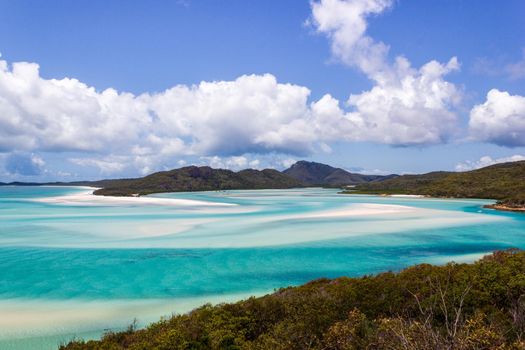 Whiteheaven beach on a beautiful sunny day with clouds, Whitsunday Island, Queensland, Australia