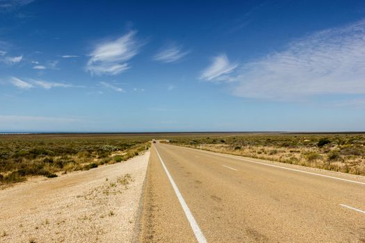 cars on the Eyre Highway at the nullarbor dessert of Australia, South Australia, Australia