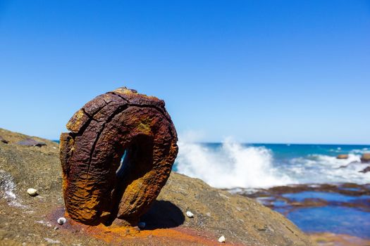 old rusty round hook from the historic Sea Clliff Bridge along the Grand Pacific Drive, Australia
