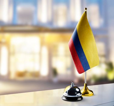 Colombia flag on the reception desk in the lobby of the hotel