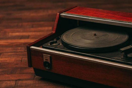 red gramophone record player vintage nostalgia wood background