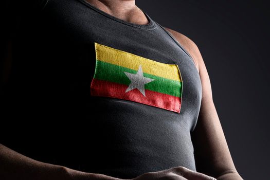 The national flag of Myanmar on the athlete's chest