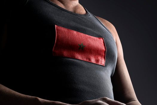 The national flag of Morocco on the athlete's chest